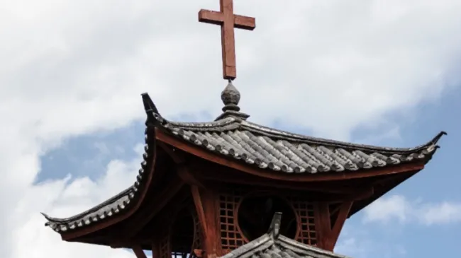 traditional chinese roof with cross